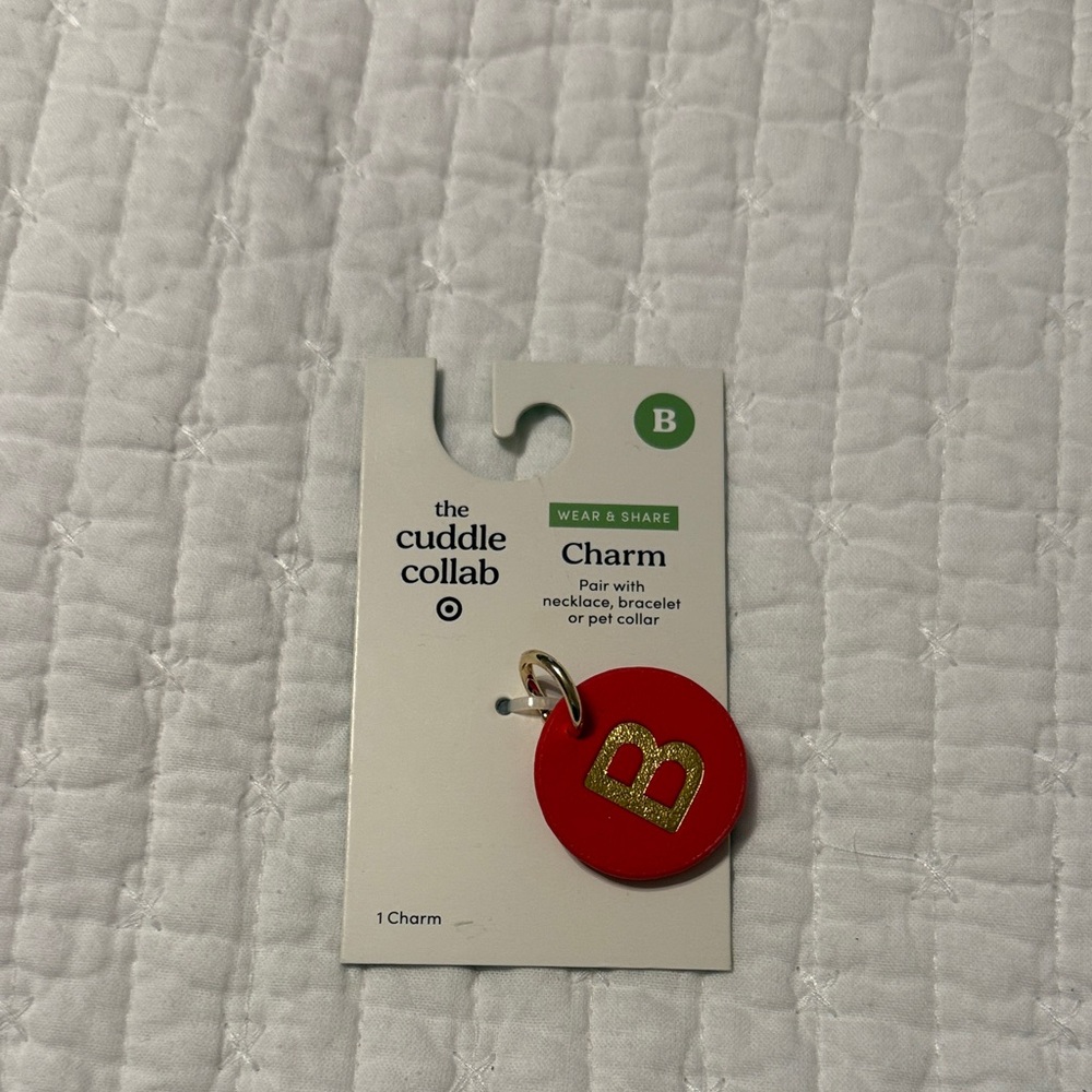 The Cuddle Collab Coral Red Charm with Gold Letter B